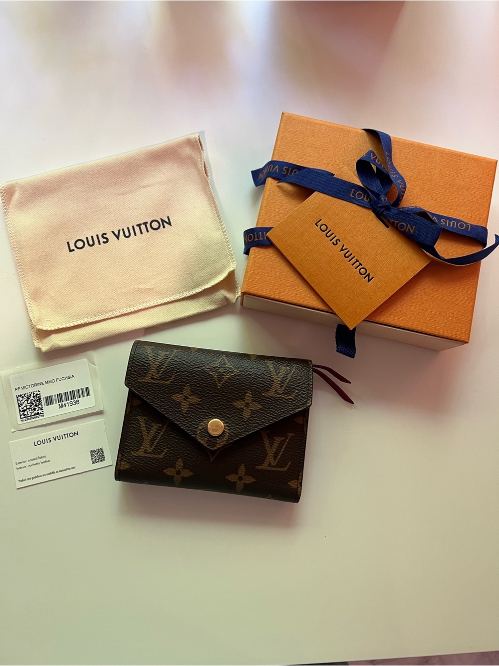 LOUIS VUITTON Victorine Wallet Monogram Fuchsia Interior MSRP $605 - Picture 2 of 16